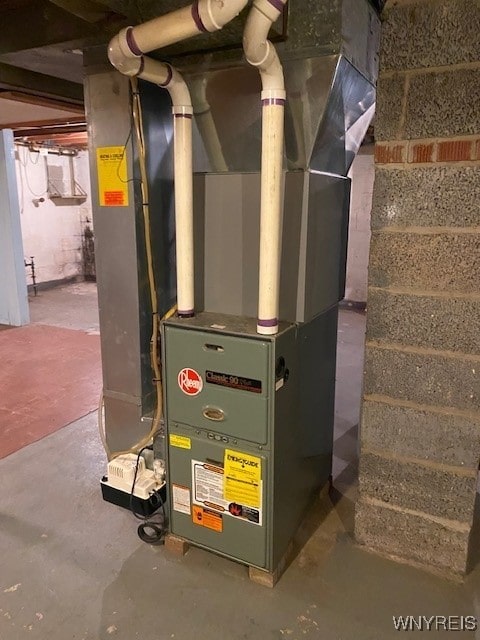 utility room with heating unit