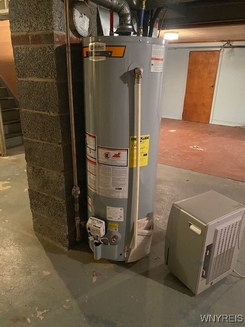 utility room with water heater