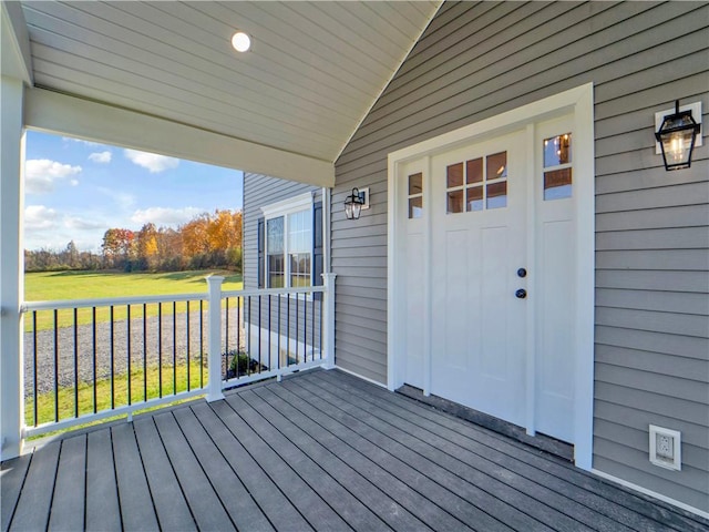 wooden terrace with a porch