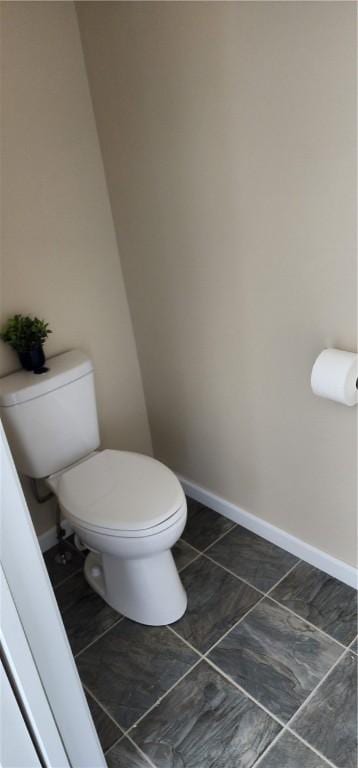 bathroom featuring toilet