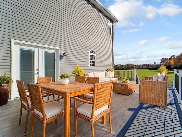 wooden deck featuring an outdoor hangout area