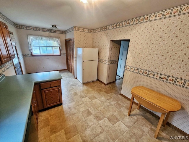 kitchen featuring white fridge