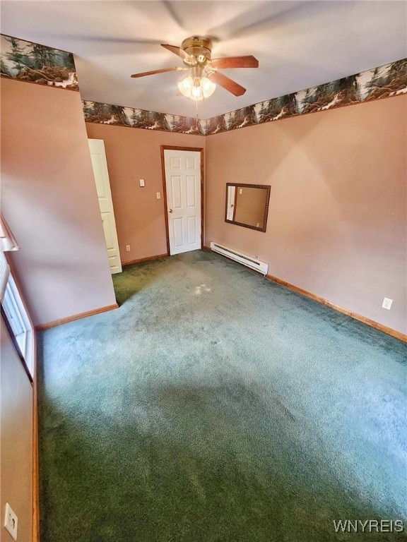 carpeted spare room featuring a baseboard radiator and ceiling fan