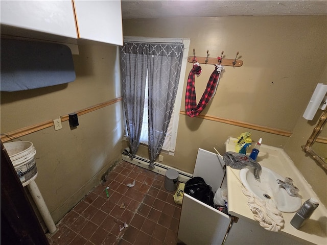 bathroom featuring tile patterned floors and sink