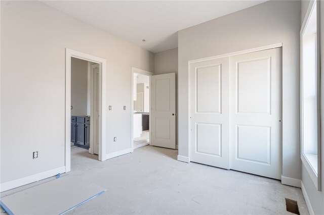 unfurnished bedroom featuring a closet