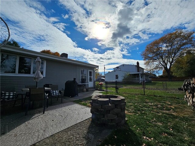 42 Pine Cir, Big Flats, NY 14845 - view of yard featuring a patio and an outdoor fire pit