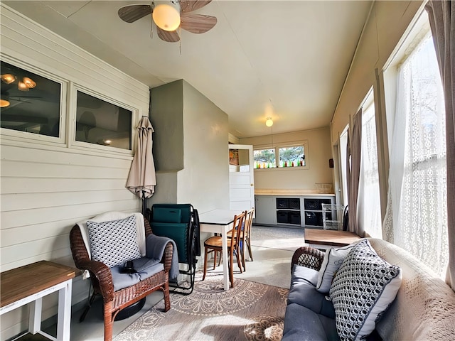 sunroom / solarium with ceiling fan