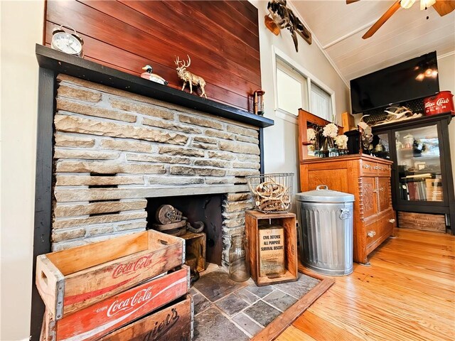 42 Pine Cir, Big Flats, NY 14845 - detailed view of ceiling fan, wood finished floors, and a fireplace