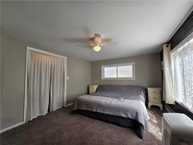42 Pine Cir, Big Flats, NY 14845 - bedroom featuring dark carpet, ceiling fan, and baseboards