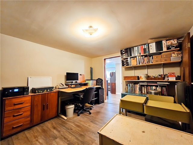 office area with light hardwood / wood-style flooring