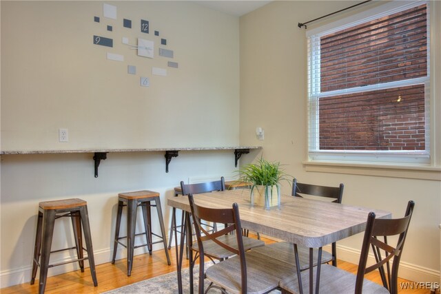 dining room with light hardwood / wood-style flooring