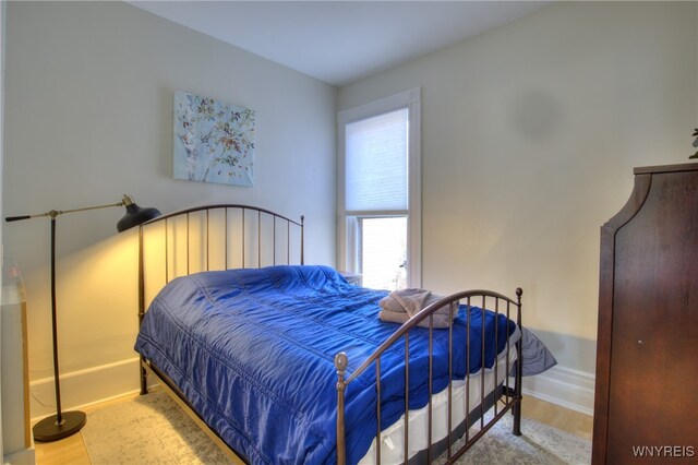 bedroom featuring hardwood / wood-style floors