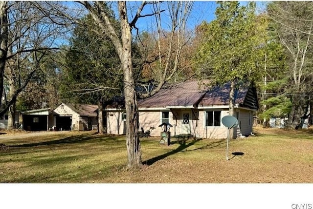 6736 Pine Grove Rd, Watson, NY 13343 - ranch-style house featuring a front yard