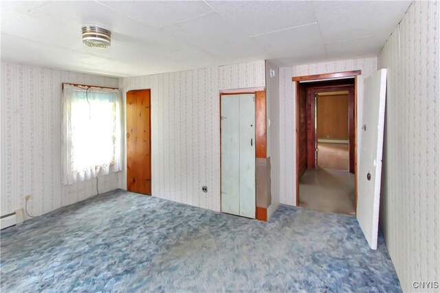 6736 Pine Grove Rd, Watson, NY 13343 - spare room with wallpapered walls and carpet
