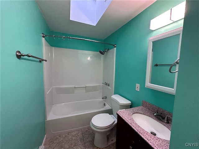 full bathroom featuring vanity, toilet, tile patterned floors, and washtub / shower combination