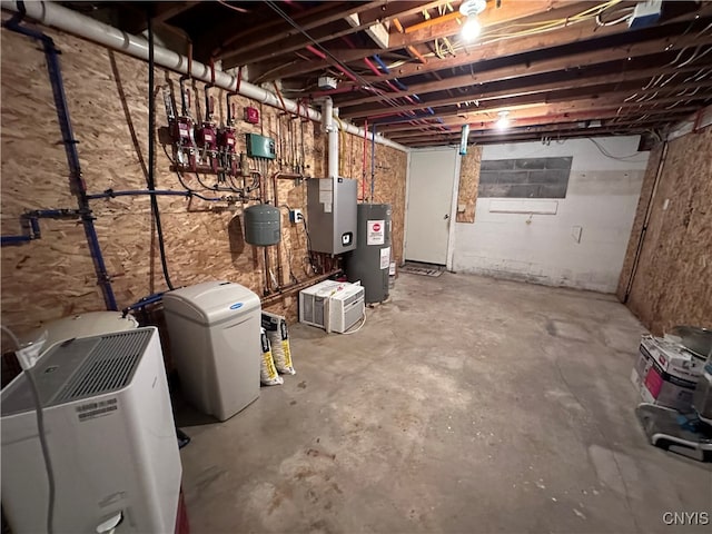 basement featuring electric water heater