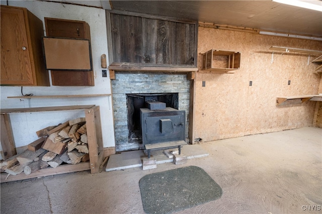 living room featuring a wood stove