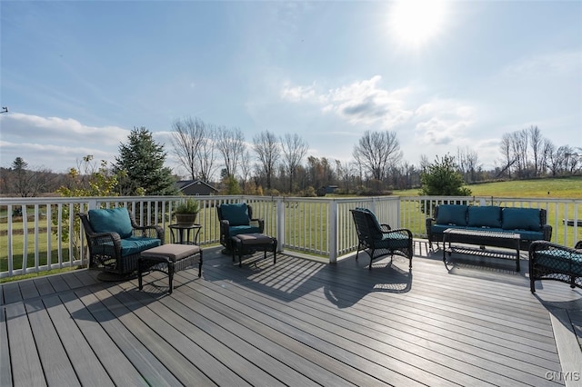 wooden terrace featuring an outdoor hangout area