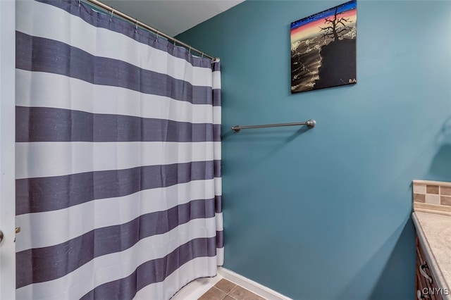 bathroom featuring vanity and tile patterned floors