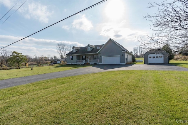 cape cod-style house with a front lawn and a garage