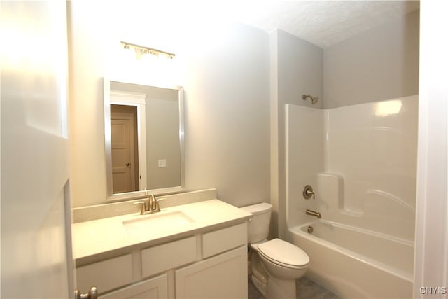 full bathroom with toilet, shower / bathing tub combination, a textured ceiling, and vanity