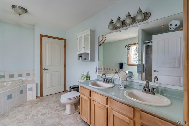 full bathroom with tile patterned floors, vanity, toilet, and plus walk in shower