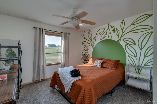 bedroom featuring ceiling fan and carpet floors