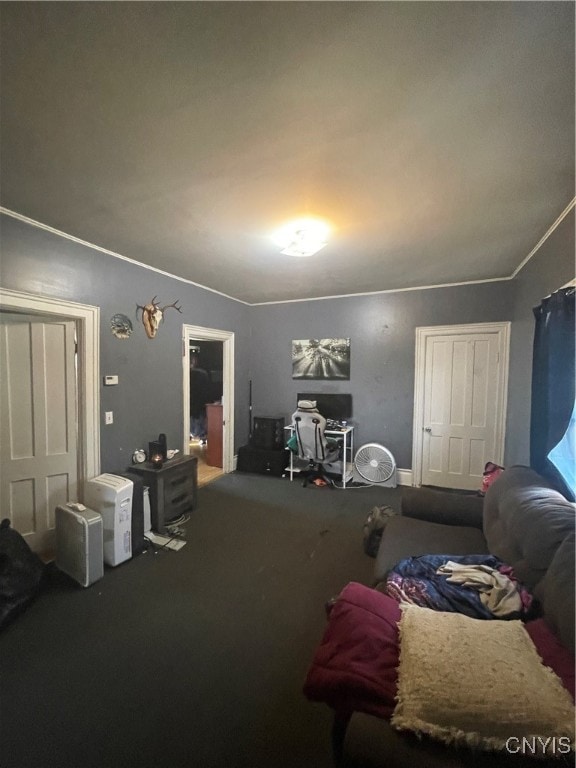 living room with ornamental molding and carpet floors