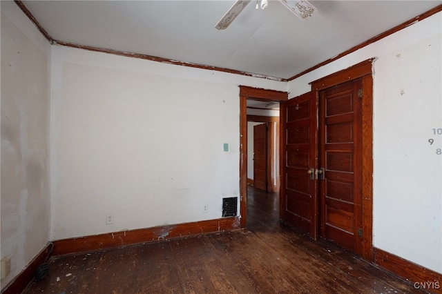 empty room featuring dark hardwood / wood-style floors