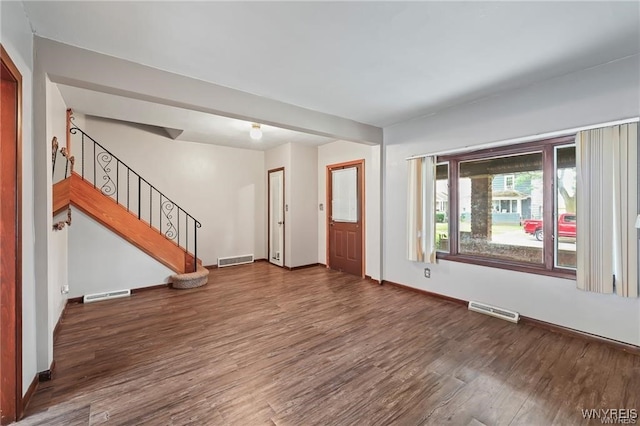 empty room featuring dark hardwood / wood-style floors