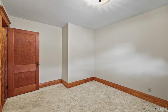 unfurnished room featuring carpet floors