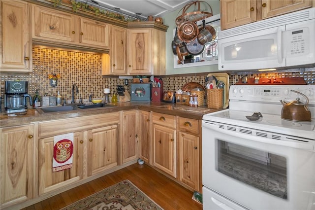 399 Fire Lane 34, Moravia, NY 13118 - kitchen with white appliances, tasteful backsplash, a sink, and dark wood-type flooring