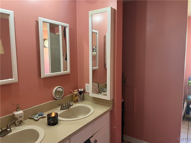 bathroom with vanity and tile patterned flooring