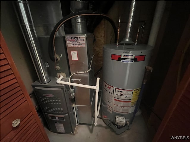 utilities featuring heating unit and gas water heater