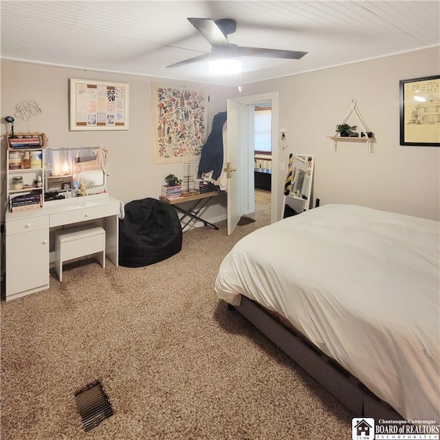 bedroom with carpet and ceiling fan