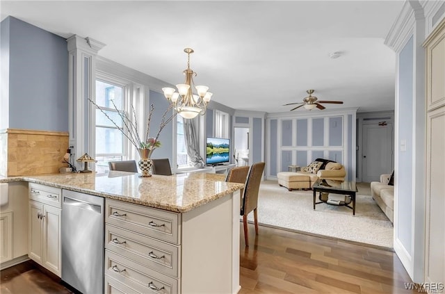 800 W Ferry St Unit 2Cc, Buffalo, NY 14222 - kitchen featuring stainless steel dishwasher, dark wood-type flooring, a peninsula, light stone counters, and a ceiling fan