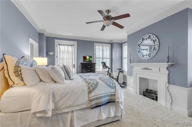 800 W Ferry St Unit 2Cc, Buffalo, NY 14222 - carpeted bedroom with ornamental molding, a ceiling fan, and a fireplace