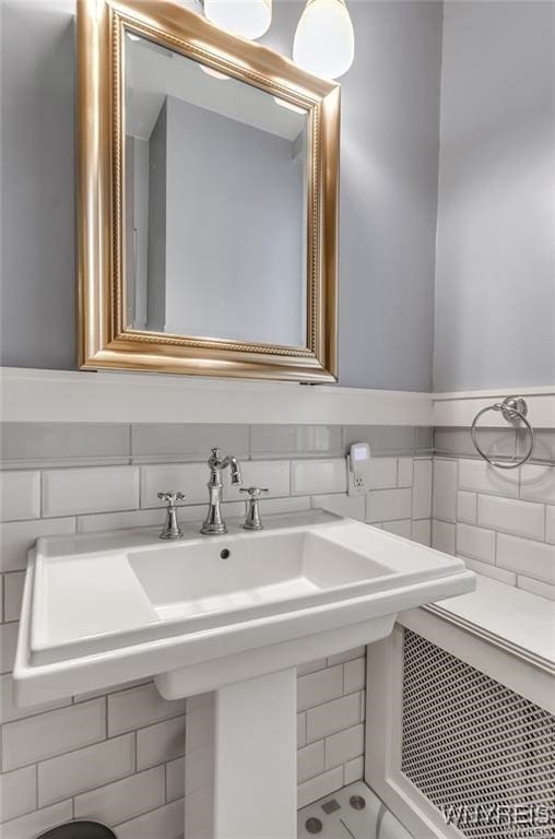 800 W Ferry St Unit 2Cc, Buffalo, NY 14222 - bathroom featuring tile walls and a sink