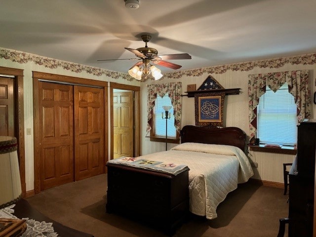 carpeted bedroom featuring ceiling fan