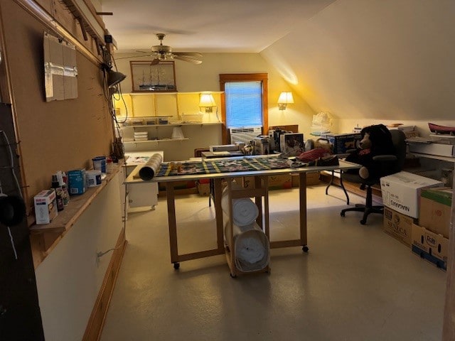 game room with lofted ceiling, a workshop area, and ceiling fan