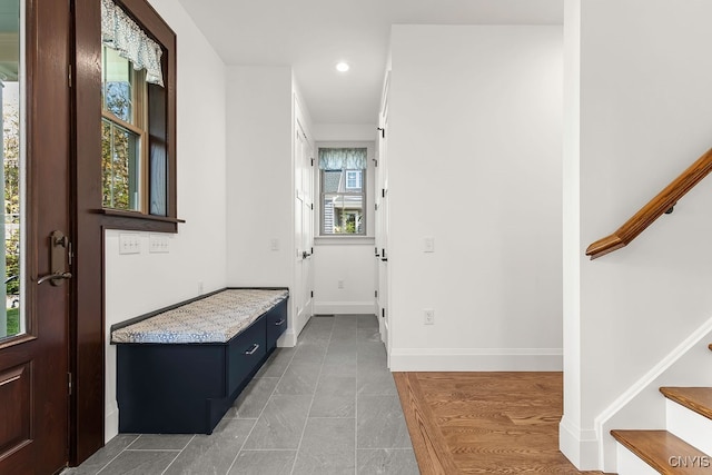 mudroom with wood-type flooring