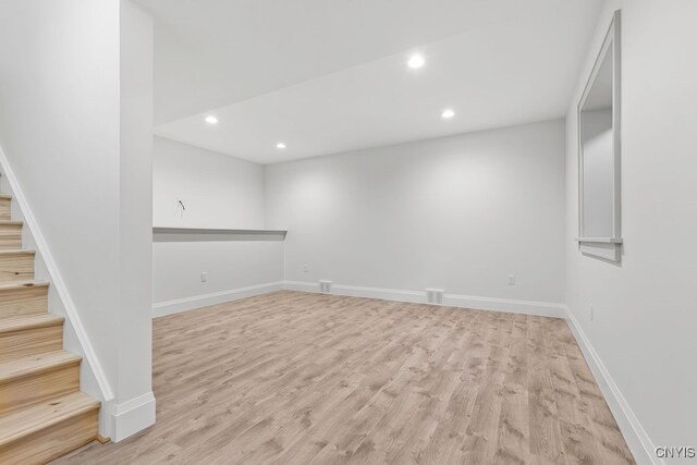 basement with light wood-type flooring