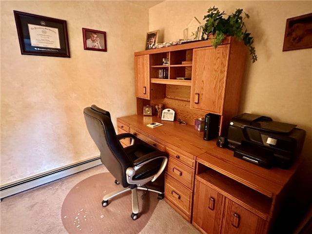 office space with a baseboard heating unit