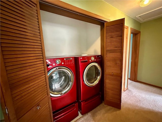 laundry room with baseboards, laundry area, separate washer and dryer, and light colored carpet