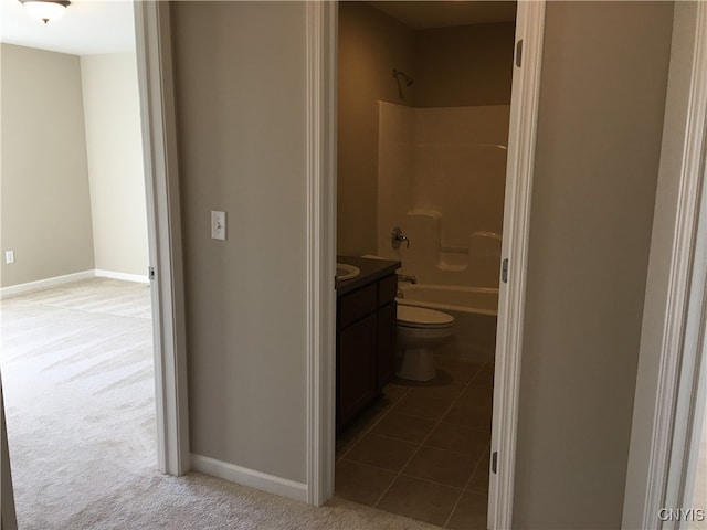 full bathroom with vanity, toilet, shower / bathing tub combination, and tile patterned flooring