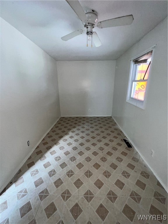 spare room featuring ceiling fan