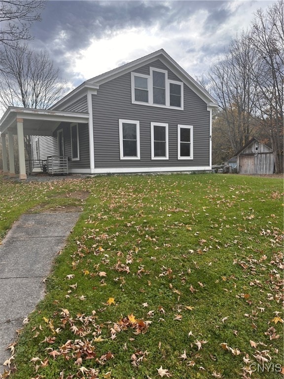 view of home's exterior featuring a yard