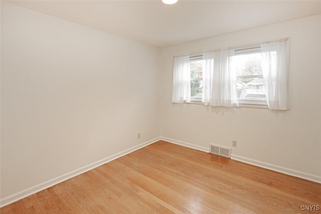 empty room featuring light hardwood / wood-style flooring