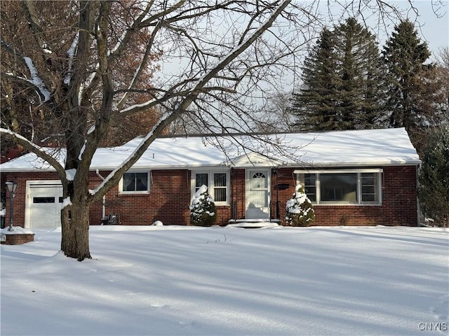 ranch-style house featuring a garage