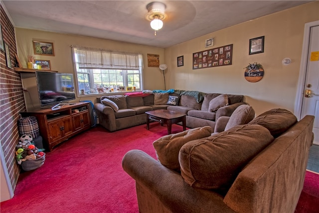 carpeted living room featuring ceiling fan